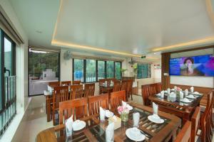 מסעדה או מקום אחר לאכול בו ב-DUNG LAI HOTEL 173