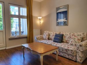 Posedenie v ubytovaní Apartament Śliwka na Monte