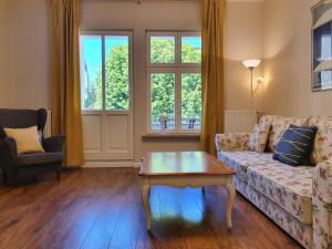 Posedenie v ubytovaní Apartament Śliwka na Monte