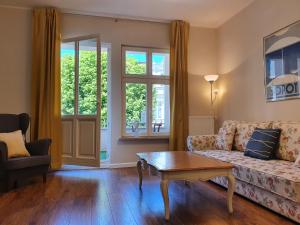 Posedenie v ubytovaní Apartament Śliwka na Monte