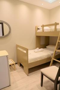 Postel nebo postele na pokoji v ubytování Hotel Strora