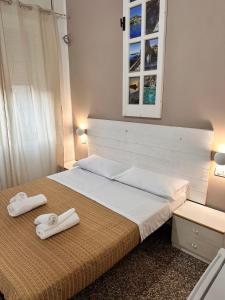 Postel nebo postele na pokoji v ubytování B&B Dora 2,0