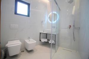 Koupelna v ubytování Hotel Strora