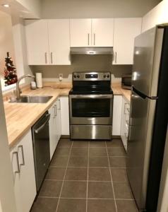 Køkken eller tekøkken på Condo de Jean et Chantale + 5 billeder