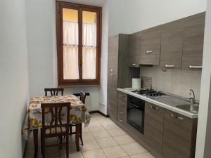 Kuchyň nebo kuchyňský kout v ubytování Ospitaci - Via Pertichetti