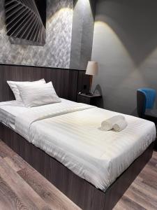 Postel nebo postele na pokoji v ubytování Swing & Pillows - KLIA 1 KLIA 2, Sepang