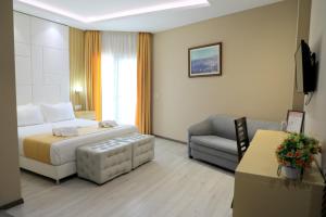 Postel nebo postele na pokoji v ubytování Hotel Strora