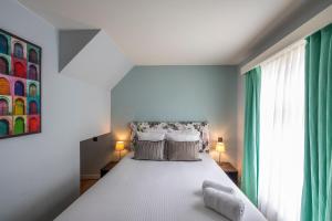 Postel nebo postele na pokoji v ubytování Hotel Onderbergen