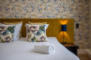Postel nebo postele na pokoji v ubytování Hotel Onderbergen