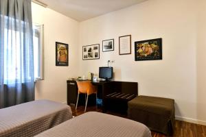 TV a/nebo společenská místnost v ubytování B&B Donna Eleonora