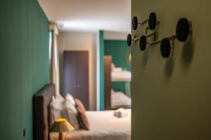 Postel nebo postele na pokoji v ubytování Hotel Onderbergen