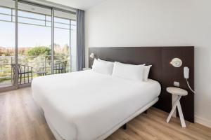 Un ou plusieurs lits dans un hébergement de l'établissement B&B HOTEL Cantanhede Coimbra