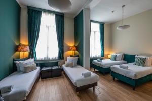 Postel nebo postele na pokoji v ubytování Hotel Onderbergen