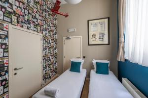Postel nebo postele na pokoji v ubytování Hotel Onderbergen