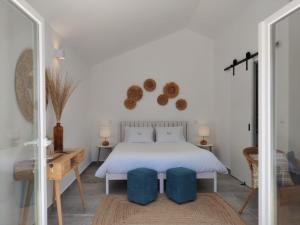 Postel nebo postele na pokoji v ubytování Quinta do Alento