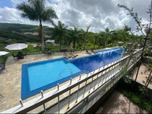 a large swimming pool on top of a building at Apt Alto da Serra Villas - Bananeiras in Bananeiras
