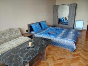 Ένα ή περισσότερα κρεβάτια σε δωμάτιο στο Mercury Guest House
