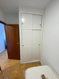 Postel nebo postele na pokoji v ubytování Apartamento cerca de la playa