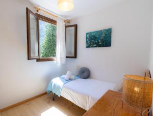 Postel nebo postele na pokoji v ubytování Apartamento familiar Canfranc Estación