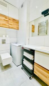 Kúpeľňa v ubytovaní Apartament z widokiem na Pałac i Kościół.