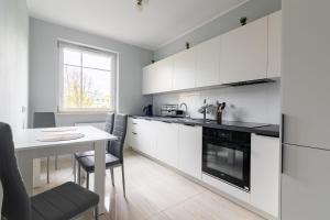 Kuchyň nebo kuchyňský kout v ubytování Apartament Olsztyn Rataja 62