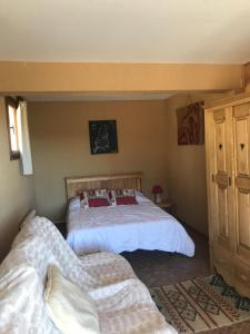 Łóżko lub łóżka w pokoju w obiekcie CHALET CAPRICES DES CIMES