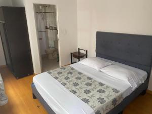 Postel nebo postele na pokoji v ubytování Hostal Casa Primavera