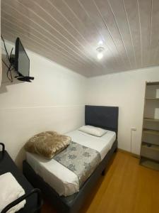 Postel nebo postele na pokoji v ubytování Hostal Casa Primavera + 37 fotografií