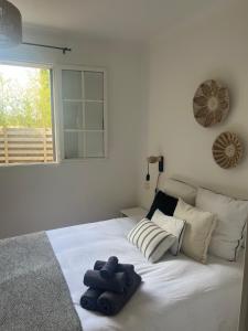 Postel nebo postele na pokoji v ubytování Le Verger