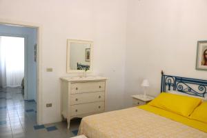 Postel nebo postele na pokoji v ubytování Villa Maria in Puglia con pineta vicino al mare