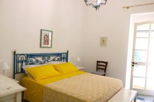 Postel nebo postele na pokoji v ubytování Villa Maria in Puglia con pineta vicino al mare