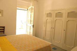 Postel nebo postele na pokoji v ubytování Villa Maria in Puglia con pineta vicino al mare
