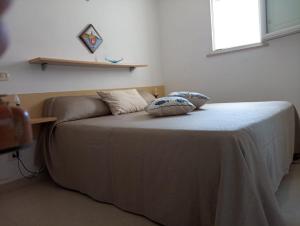 Postel nebo postele na pokoji v ubytování Zannone Mono