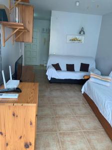 Posteľ alebo postele v izbe v ubytovaní SERVICE APART LAZARO - Aguamarina 1 dormitorio