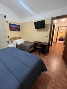 Postel nebo postele na pokoji v ubytování Da Sciuri case vacanza Barisciano
