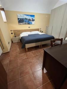 Postel nebo postele na pokoji v ubytování Da Sciuri case vacanza Barisciano