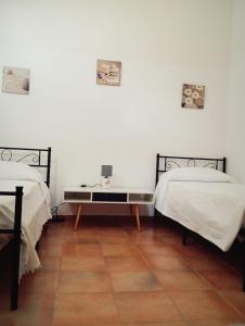 Postel nebo postele na pokoji v ubytování MamaSita