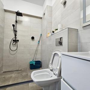 Et badeværelse på Apartament Dem Rădulescu langa strand + 28 billeder