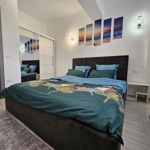 Apartament Dem Rădulescu langa strand tesisinde bir odada yatak veya yataklar