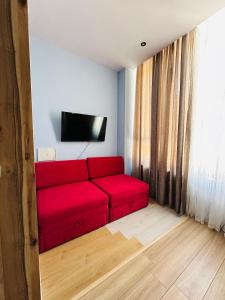 TV a/nebo společenská místnost v ubytování Colombia Apartments&Rooms + 105 fotografií