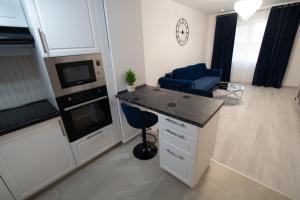 Η κουζίνα ή μικρή κουζίνα στο Happy Place