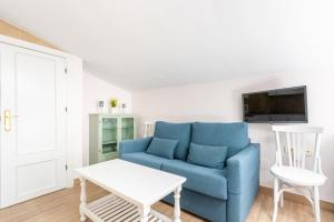 Televízia a/alebo spoločenská miestnosť v ubytovaní WintowinRentals Cómodo Estudio en Málaga.