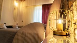 Cama ou camas em um quarto em Lithoessa Luxury Apartments