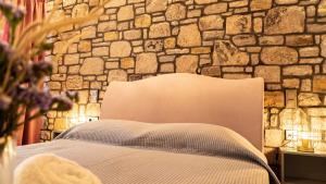 Cama ou camas em um quarto em Lithoessa Luxury Apartments