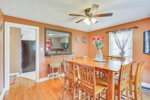 a dining room with a table with chairs and a ceiling fan at Bring Your Pet and Visit Springfield Westfield Home in Westfield