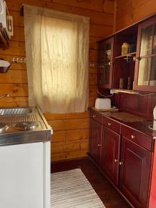 Kuchyň nebo kuchyňský kout v ubytování Kaldbaks-kot cottages