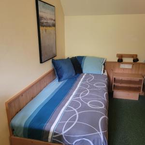 Posteľ alebo postele v izbe v ubytovaní Haus Waldviertel am Herrensee