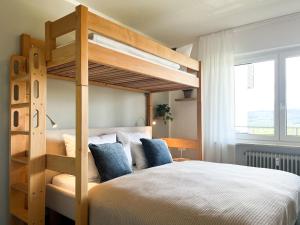 Postel nebo postele na pokoji v ubytování Panoramablick mit Schwimmbad und Sauna