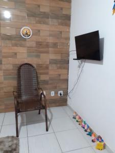 TV a/nebo společenská místnost v ubytování Casa a 5 minutos da basílica nova