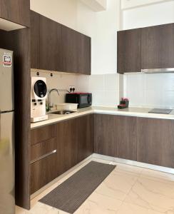 Kuchyň nebo kuchyňský kout v ubytování One Bedroom Troika Kota Bharu @ AGhome (Commoneo Theme)